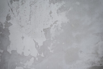 wet plaster with stains on the wall close-up