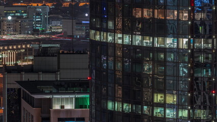 Fototapeta na wymiar Aerial view of Dubai Internet City Lake and Buildings night timelapse
