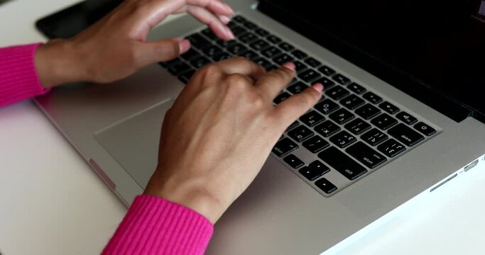 Female hands of business woman professional user worker using typing on laptop notebook keyboard sit at home.