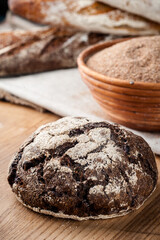 Bread. Baked bread. Craft bakery. Sliced bread on a wooden background. Food blog, food, pastries, flour, hot, fragrant, morning, fresh bread