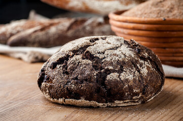 Bread. Baked bread. Craft bakery. Sliced bread on a wooden background. Food blog, food, pastries, flour, hot, fragrant, morning, fresh bread