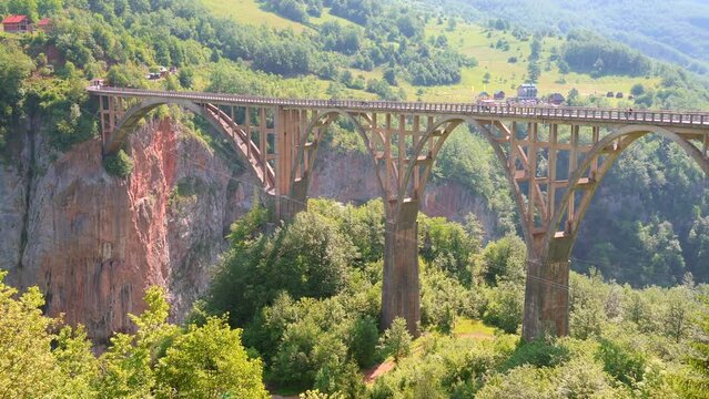 Scenic footage of the arch bridge Durdevica over Tara canyon. Filmed in UHD 4k video.