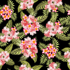 Vector seamless pattern of green tropical leaves with plumeria and hibiscus flowers on background. Seamless tropical pattern