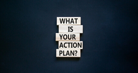 Action plan symbol. Concept words What is your action plan on wooden blocks. Beautiful black table...