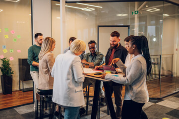 Multiracial business team working together and having a meeting in the office