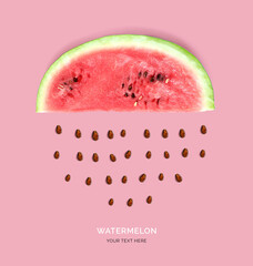 Creative layout made of watermelon. Flat lay. Food concept. Watermelon on the pink background.