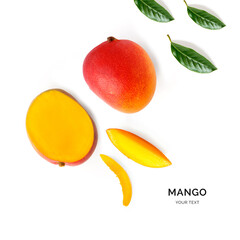 Creative layout made of mango and leaves. Flat lay. Food concept. Mango on white background.