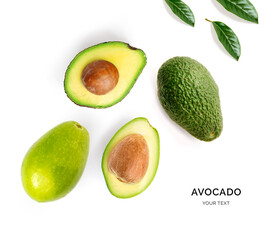 Creative layout made of avocado and leaves. Flat lay. Food concept. Avocado on white background.