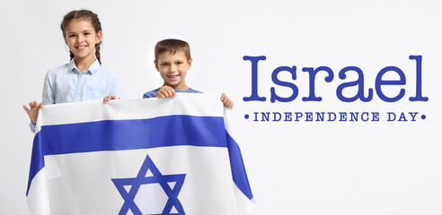 Little children with flag and text ISRAEL INDEPENDENCE DAY on white background