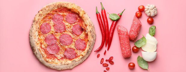 Tasty pizza with ingredients on pink background