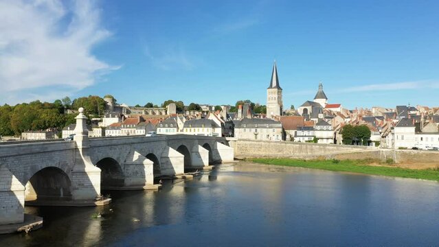 The medieval bridge of Charite sur Loire in Europe, France, Burgundy, Nievre, in summer, on a sunny day.