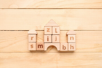 Obraz na płótnie Canvas Cubes with letters on wooden background