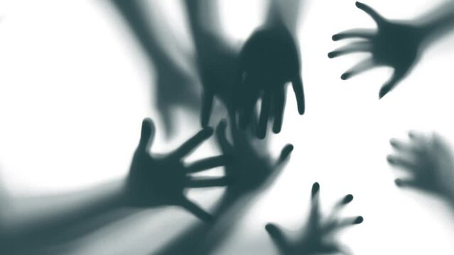 Shadow of a zombie hand on white background
