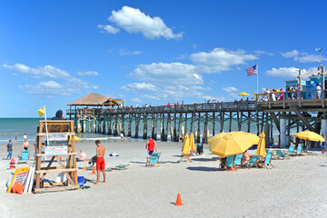 Lifeguards on tower guarding swimmers at Cocoa Beach pier near Cape Canaveral on Florida's Space...