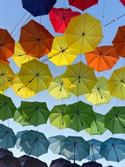 colorful umbrellas on white background