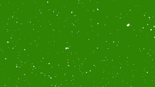 Snow falling on green background