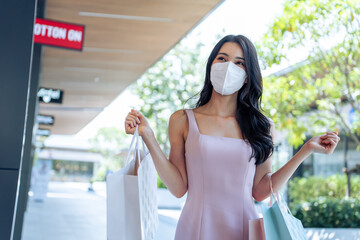 Asian beautiful young woman shopping goods outdoor in department store