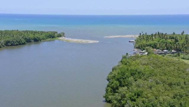 Soco river mouth, San Pedro de Macoris in Dominican Republic. Aerial drone panoramic view