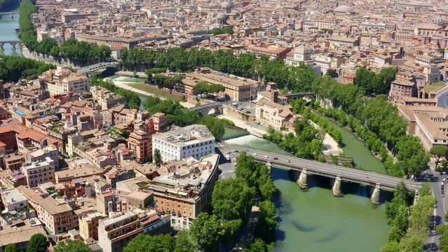 Aerial view of Tiber Island, the only river island in the part of the Tiber which runs through Rome, Italy. In the period of ancient Rome, the temple of Asclepius stood here.