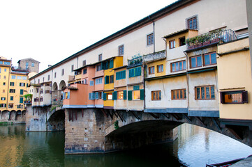 Fototapeta na wymiar Historic Ponte Vecchio arch bridge over Arno river in Florence, Italy