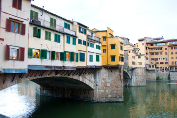Fototapeta na wymiar Historic Ponte Vecchio bridge over Arno river in Florence, Italy