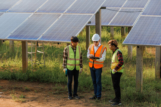 Solar power plant. Engineers Went to check the operation of the system Solar Farm. Renewable energy to conserve the world's energy Photovoltaic module concept for clean energy generation.