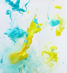 Fototapeta na wymiar Splash of blue and yellow ink. Ukraine flag colors abstract background