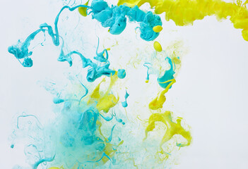 Splash of blue and yellow ink. Ukraine flag colors abstract background