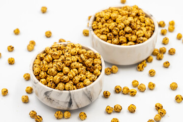 Roasted chickpeas on a white background. Close-up. local name leblebi