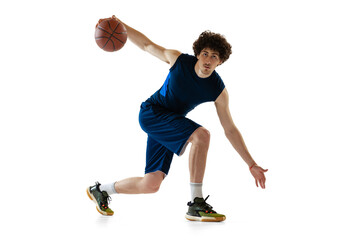 Young muscular basketball player in action, motion isolated on white background. Concept of sport,...