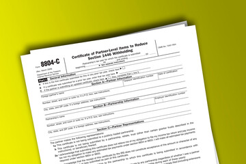 Form 8804-C documentation published IRS USA 07.17.2012. American tax document on colored