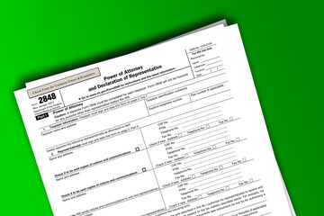 Fototapeta na wymiar Form 2848 documentation published IRS USA 01.23.2021. American tax document on colored
