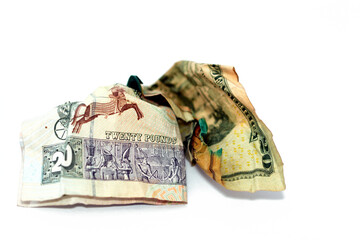 Crumpled  wrinkled American money note of 20 $ twenty dollars bill and 20 LE twenty Egyptian pounds...