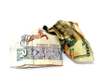 Crumpled  wrinkled American money note of 20 $ twenty dollars bill and 20 LE twenty Egyptian pounds...