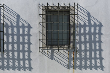 window grid on one side of the Cathedral of Aveiro, also referred to as Church of St. Domingo in...