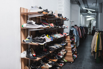 Shoes on rack in second hand.