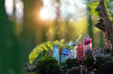quartz gemstones towers on mysterious sunny forest natural background. minerals for esoteric Magic crystal Ritual, Witchcraft, spiritual practice. reiki therapy for life balance, soul relax, harmony - obrazy, fototapety, plakaty