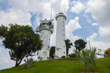 Bukit Jugra, Malaysia - April 16,2022: The lighthouse with the civilian radar system on the roof at...