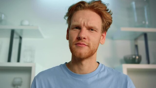 Excited man talking virtual meeting closeup. Impressed motivational speaker