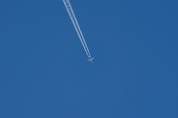 plane flying in the sky, traces
