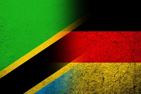 The national flag of Germany with The United Republic of Tanzania National flag. Grunge background © Chernobrovin