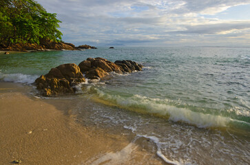 Beautififul water and waves on the beach in morning light