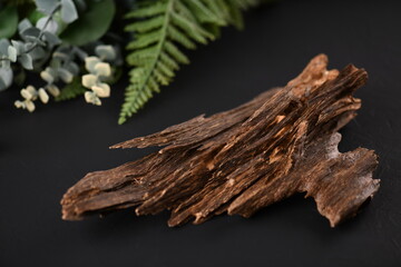Close UpShot Of Sticks Of oudh On Black Background The Incense Chips Used By Burning It Or For Arabian Oud Oils Or Bakhoor
