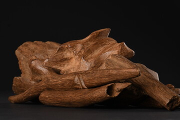 Close UpShot Of Sticks Of oudh On Black Background The Incense Chips Used By Burning It Or For Arabian Oud Oils Or Bakhoor

