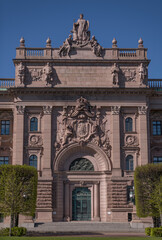 Obraz premium The Parliament house entre with Swedish flags a sunny day in Stockholm