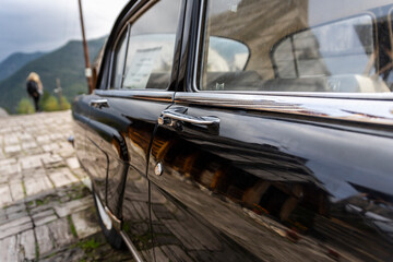 Side view of an old timer classic car