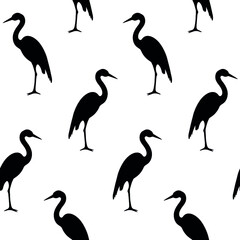 Vector seamless pattern of hand drawn doodle sketch heron silhouette isolated on white background
