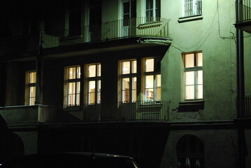 building at night, illuminated facade, gloomy