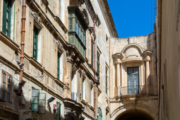 Fototapeta na wymiar Traditional Maltese House Facades in the City Center of Valetta on the Island of Malta 