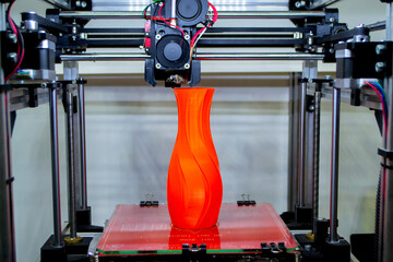 Process printing model on 3d printer. High tech digital printer computer machine in action....